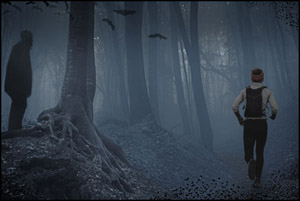 man-running-in-woods-at-dusk-with-bats