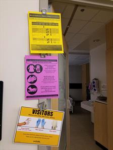 isolation-signs-hanging-hospital-door
