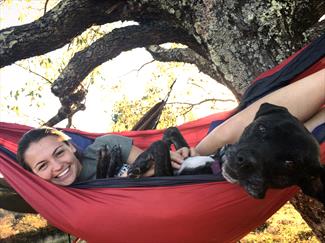 girl-and-dog-in-hammock